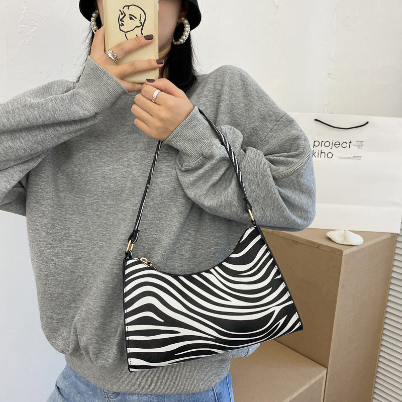 Fashion Leopard Print One Shoulder Cow Underarm Baguette Bag